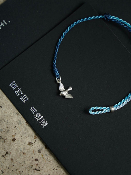 Flying Bird Silver Braided Bracelet